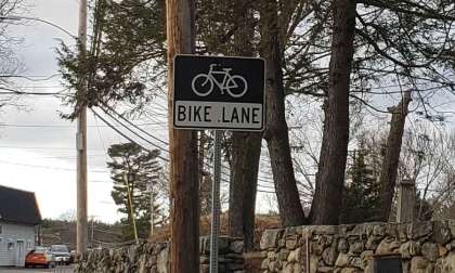 Image of bike lane sign by John Goreham
