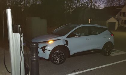 Image of Chevy Bolt EUV charging in a public place at night on Chargepoint charger