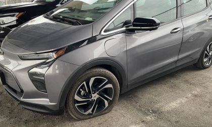 Image of Chevrolet Bolt battery-electric car with flat tire used with permission