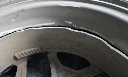 Image of a badly damaged Ford Bronco Sport Badlands wheel and tire