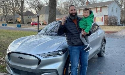 Ford engineer proudly displays keys of an EV he worked to design