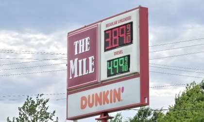 A gasoline station sign in Greenville, NH shows gas at well under $4/gallon