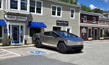 Image shows a Tesla Cybertruck in a retail area looking shiny and ready for action