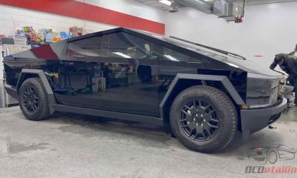 Tesla Cybertruck Seen Being Detailed In Shop Without Side Mirrors - In Gloss Black Wrap