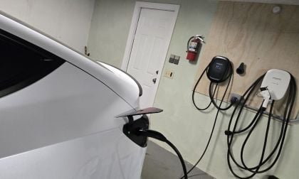 A 2022 Tesla Model Y Performance undergoes battery testing while connected to an Emporia Level 2 charger