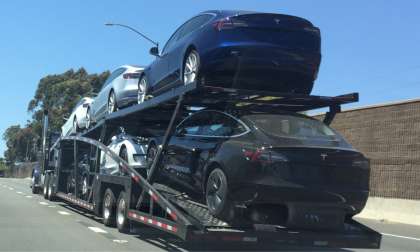 Tesla Model 3 car carrier trailer makes its way on the Hollywood Freeway loaded with Model 3’s for delivery.