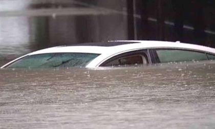 Vehicle Submerged By Rains Following Hurricane