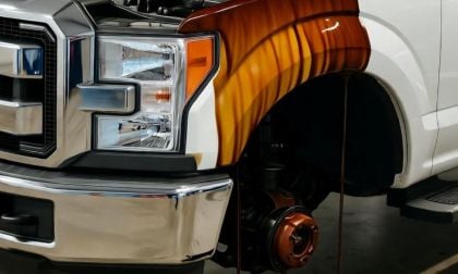 Ford F-150 with oil leaking over the sides 