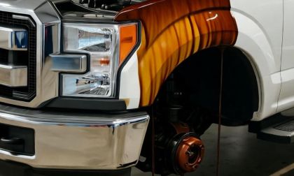 Ford F-150 with oil leaking over the sides 