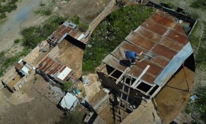 On Site Construction At Giga Mexico Begins - Worker Seen Tearing Down A Decades Old Building