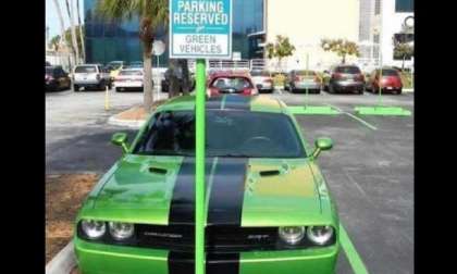 Green Dodge Challenger Parked in a green place