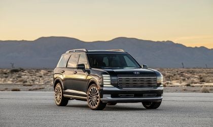 Black Hyundai Palisade parked at sunset in desert landscape