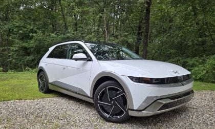 2025 Hyundai Ioniq 5 Limited in Atlas White shown with a wooded backgdrop 