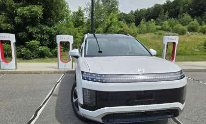 2026 Hyundai Ioniq 9 charges at a Tesla Supercharger