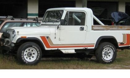 White Jeep CJ-8 Scrambler