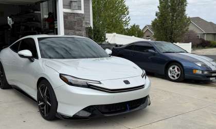 A 2026 Honda Prelude sits next to a Nissan 300ZX in an enthusiasts garage