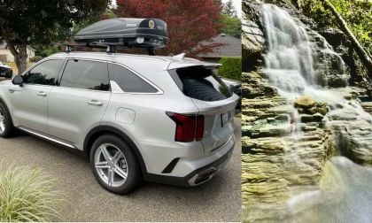 Silver Kia Sorento PHEV and waterfall