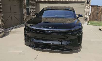 Front view of a black 2026 Lucid Gravity GT highlighting Lucid’s slim LED lighting and smooth front fascia.