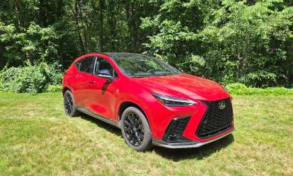 2026 Lexus NX350H sits against a rural backdrop