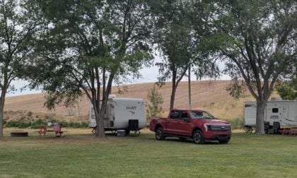 Jturkish’s Ford F-150 Lighting and camper trailer at campsite