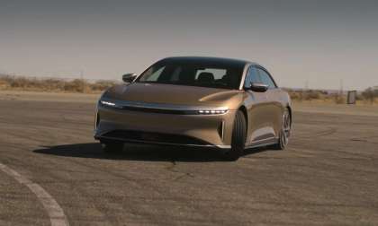 Image showing a gold Lucid Air drifting during Hagerty's road test.