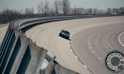 Image showing the Lucid Air Alpha Speed Prototype on the curved banking at Ohio's Transportation Research Center.