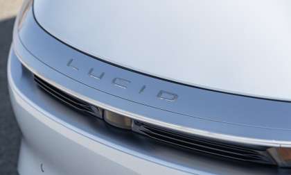 Image showing the hood, headlights and cameras in the nose of a white Lucid Air.