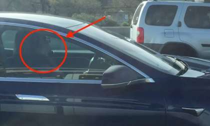 Driver sleeping behind Tesla Model s Autopilot