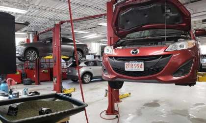 Image of Mazda vehicles being serviced by John Goreham