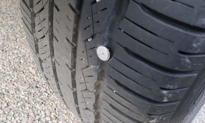 Tire with nail image by John Goreham