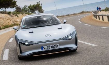 Image showing the Mercedes Vision EQXX driving on a twisting coast road.