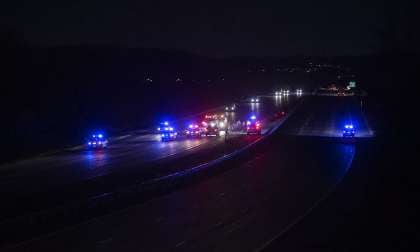 An image shows a nighttime crash on a highway