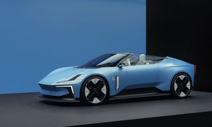 Image showing the Polestar 6 in blue with its roof down.