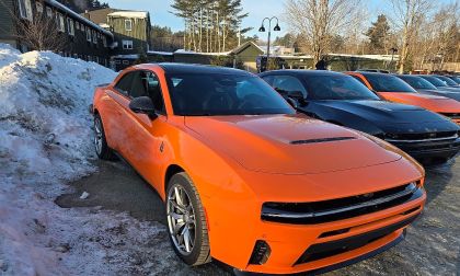 A row of 2026 Dodge Chargers is shown in a snowy setting
