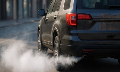 Exhaust fumes coming from the tailpipe of a gas-powered car