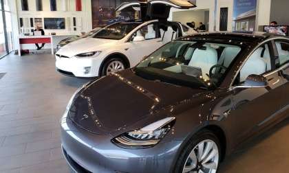 Image of Model 3 and Model Y inside of Massachusetts Tesla dealership by John Goreham
