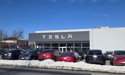 A Tesla dealership in Massachusetts is stocked with cars in a winter setting