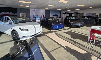 A Tesla dealership in Peabody Massachusetts has many cars on the showroom floor