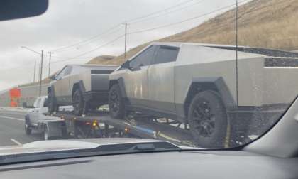Two Tesla Cybertrucks being towed on California road