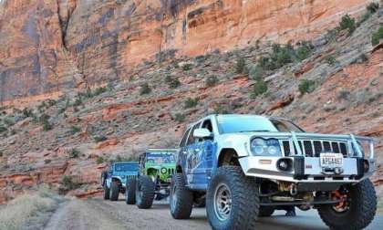 Three Jeep Wranglers On The Road