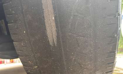 A Tesla Cybertruck's Pirellis tire is worn to the cords at just 17,000 miles