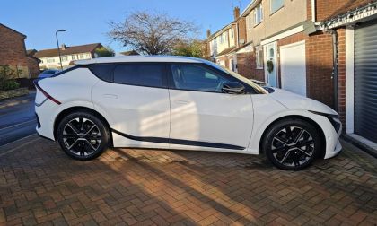White Kia EV6 outside of owner’s home