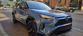 A 2025 Toyota RAV4 Hybrid strikes a handsome pose