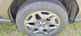 Dunlop Grandtrek PT20 A/S Tires are shown on a 2026 Subaru Outback Premium