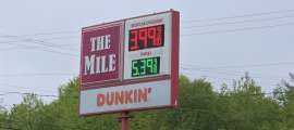 A gas price sign show $3.99 in Greenville New Hampshire
