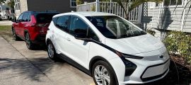 A Chevy Bolt is shown in a sunny Florida setting