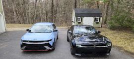A Hyundai Ioniq 5 N sits side by side with a Dodge Daytona Charger EV