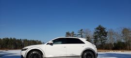 A Hyundai Ioniq 5 is shown on a snowy plain