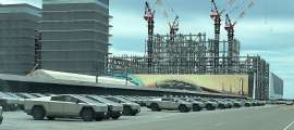 SpaceX visitor pictured hundreds if not more Tesla Cybertrucks evenly parked at SpaceX parking lot.