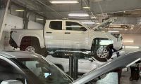 2024 Toyota Tacoma being serviced at a dealership